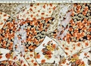 Fantasía satén flores teja beige